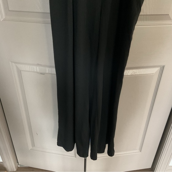 Black Palazzo Jumpsuit with Smocked Bodice - Picture 4 of 9